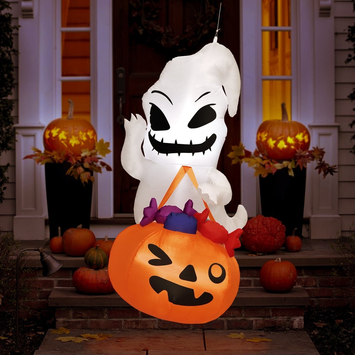 5ft. Inflatable Ghost Holding Trick or Treat Bag - PopFun